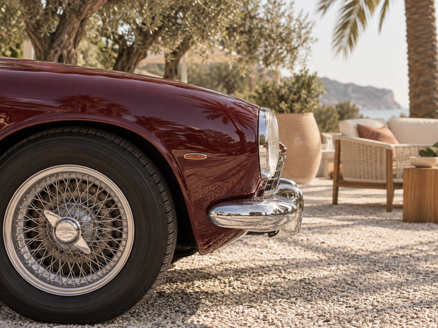 Timeless Drive campaign illustration: classic car details beside an outdoor lounge.