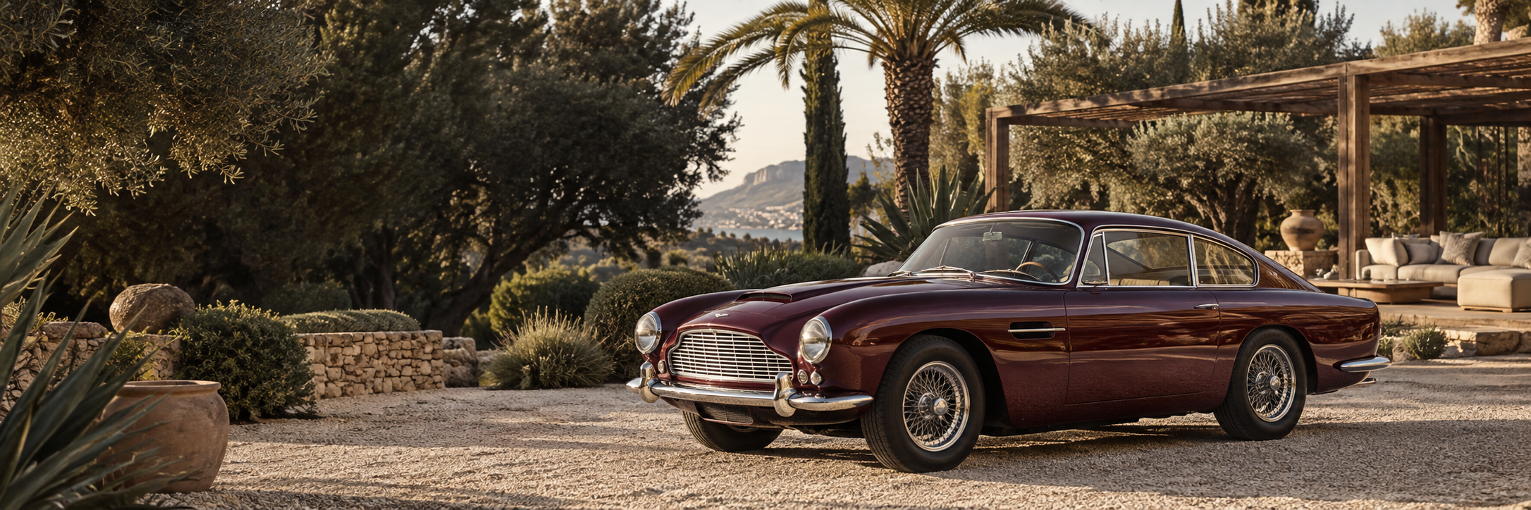 Timeless Drive campaign illustration: a burgundy classic car in a Mediterranean garden.